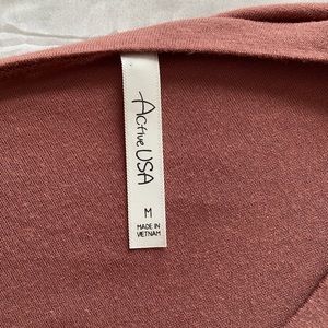 active USA distressed blush colored shirt